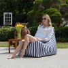 Modern outdoor bean bag chair with handle for stylish patio or poolside lounging